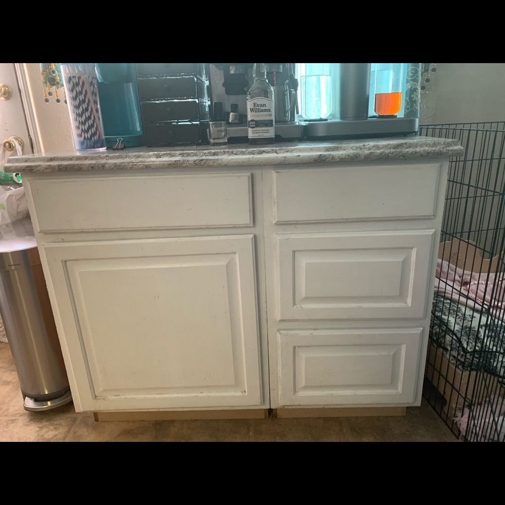 Two cabinets and one with countertop